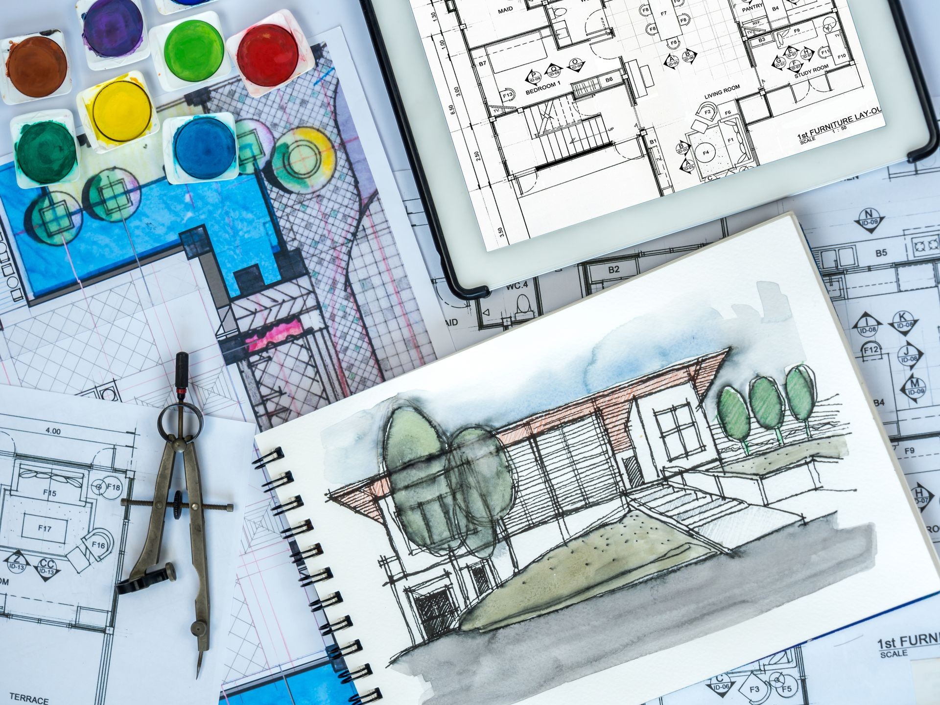 Top view of architect, interior designer worktable with tablet computer, perspective view sketch & blue print  / Real estate business & renovation  conceptual